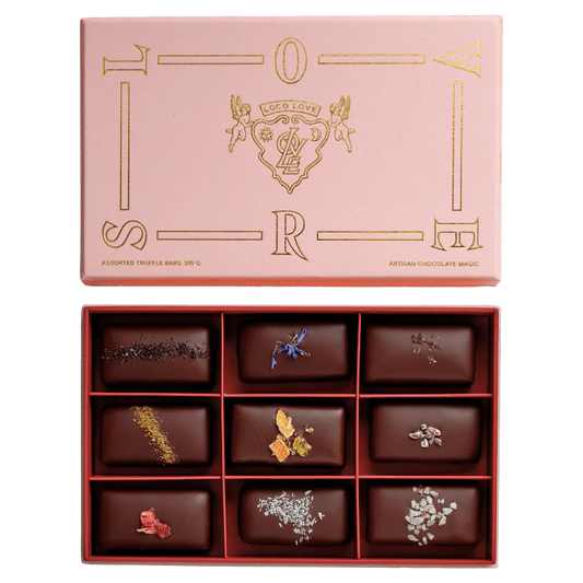 Luxury chocolate set with decorative cover on a white background